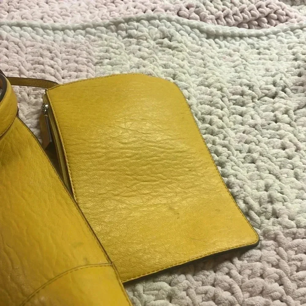 Calvin Klein few spots well loved pvc material.